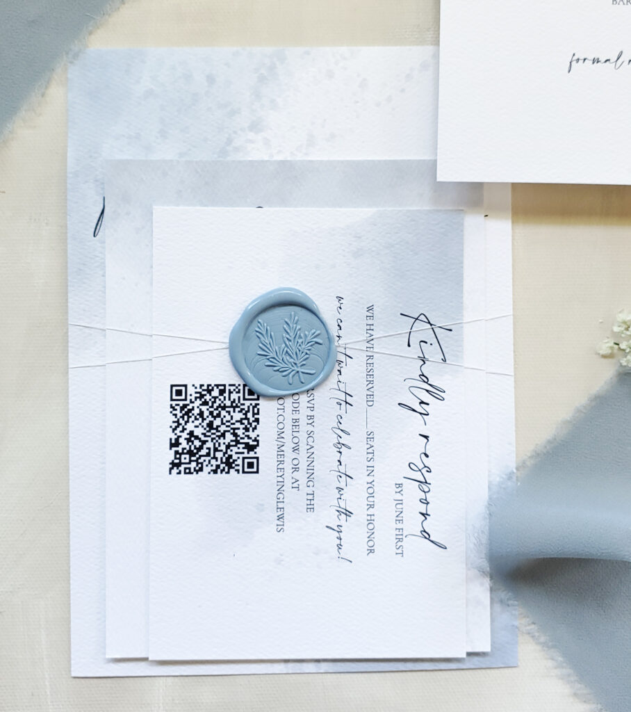 dusty blue invitation with qr code rsvp and wax seal