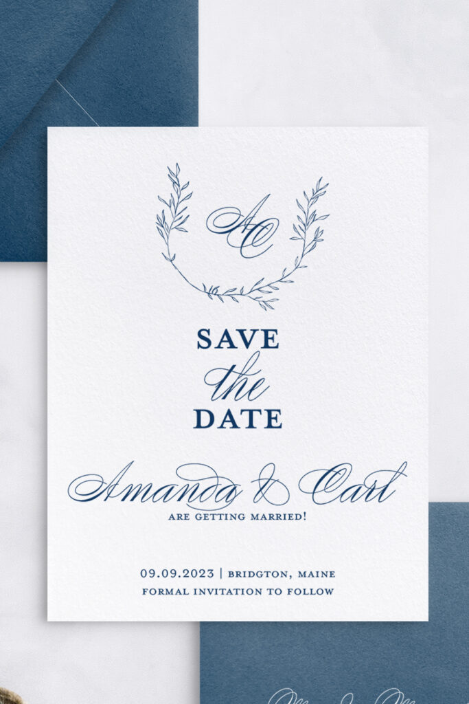 Timeless monogram save the date with laurel artwork and classic details