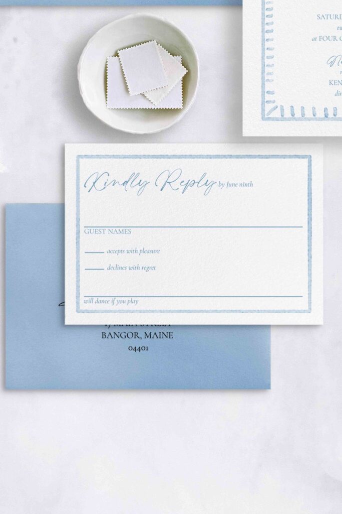 Nautical watercolor monogrammed invitation with seaside vibe and anchor envelope liner