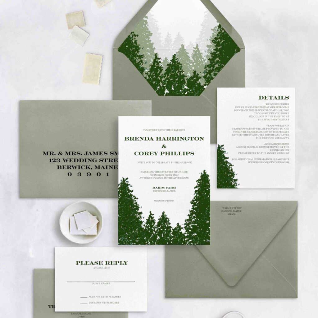 woodsy weeding invitation suite with evergreen trees and envelope liner